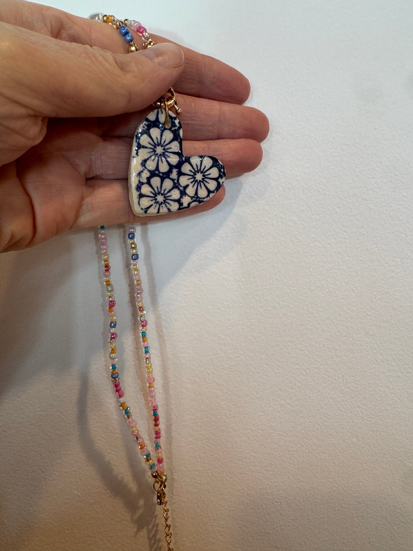 Beaded Necklace with Blue Floral Ceramic Pendant