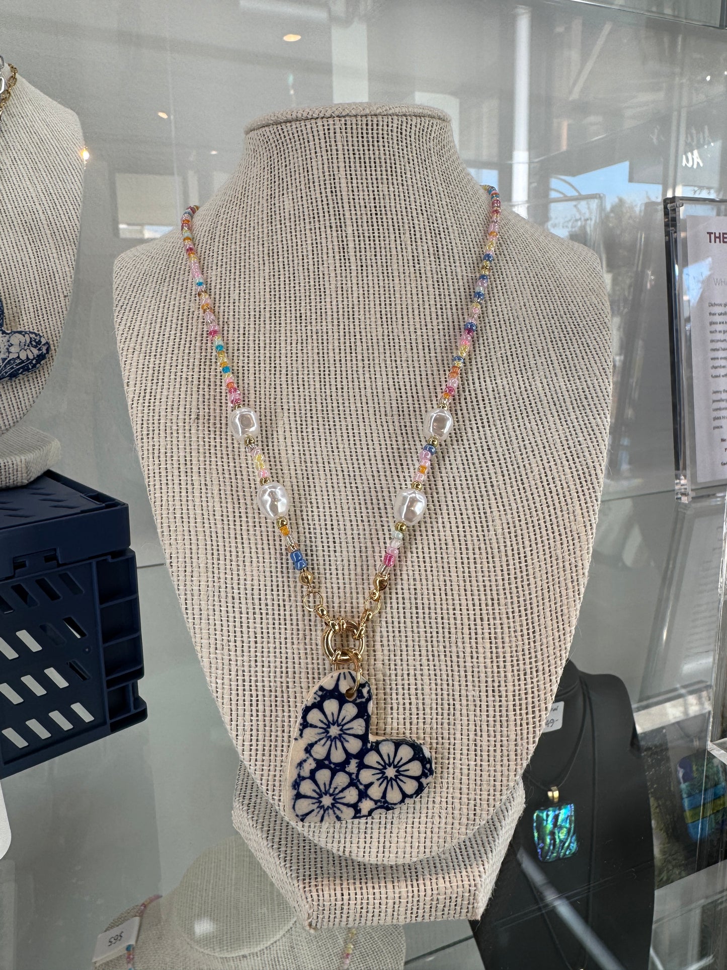Beaded Necklace with Blue Floral Ceramic Pendant